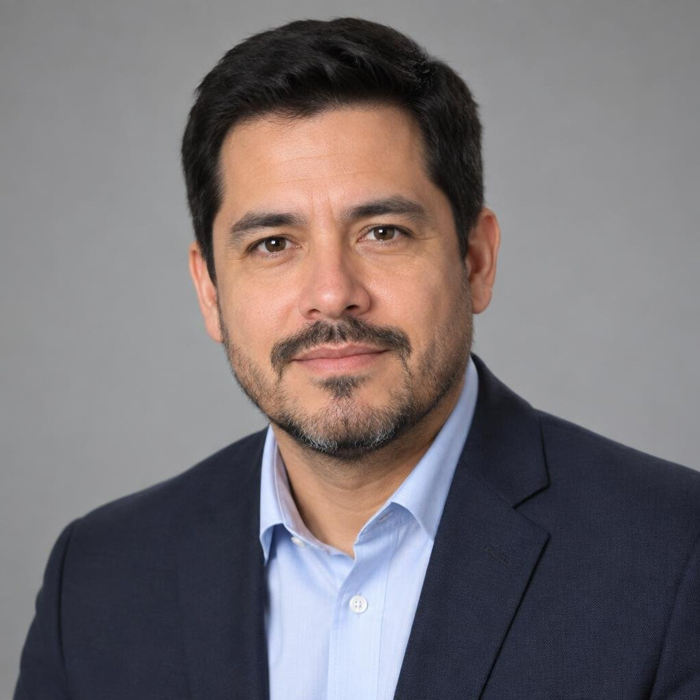 Portrait of a Hispanic man journalist in his early forties