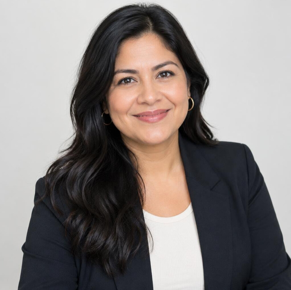 Portrait of a Hispanic woman editor in her late thirties